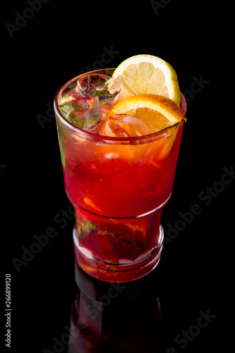 Alcoholic or non-alcoholic grapefruit, citrus, berry cocktail with liqueur, vodka, champagne or martini. Cool drink. Easy Bartenders Recipes and Ideas isolated on black background. Cocktail card