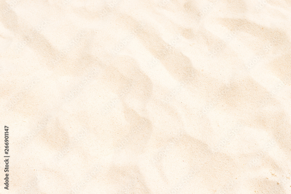 Closeup view of white fine sand texture. Can be used as summer vacation background Closeup view of white fine sand texture. Can be used as summer vacation background