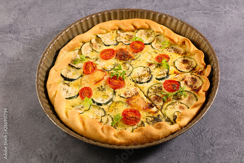 vegetable quiche with zucchini, tomato and goat cheese