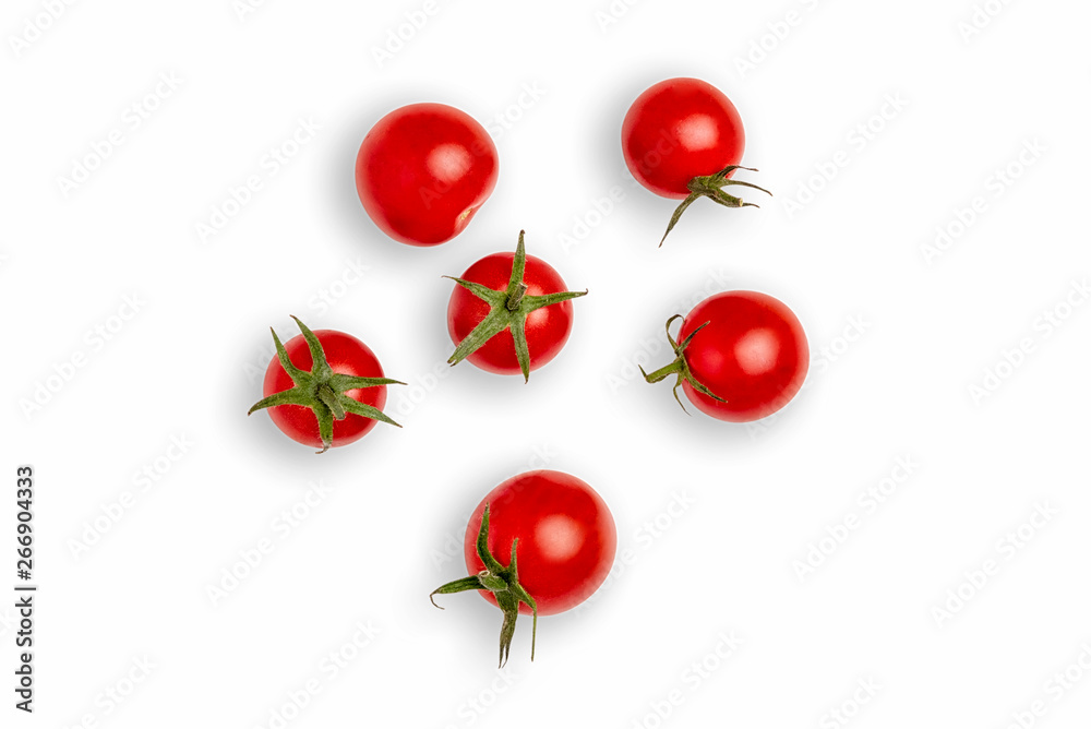Close-up of fresh Tomatoes on a white background. Tomato on the white isolated background. Ripe tomatoes. Close-up of fresh Tomatoes on a white background. Tomato on the white isolated background. Ripe tomatoes.