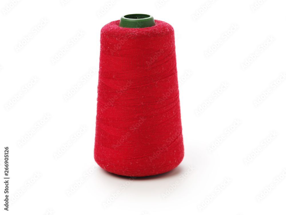 spools of thread for the textile industry on white background spools of thread for the textile industry on white background