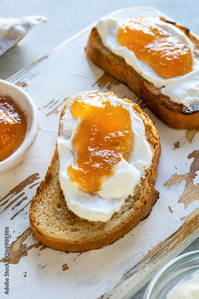 Toasted whole wheat bread with apple jam, ricotta (cream cheese) Toasted whole wheat bread with apple jam, ricotta (cream cheese)