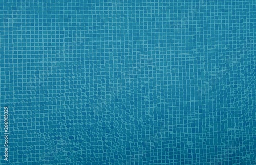 Blue Swimming Pool Bottom Tile Texture. Water Waves Surface Ripple Pattern Background. 