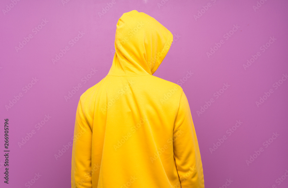 Handsome man with yellow sweatshirt Handsome man with yellow sweatshirt