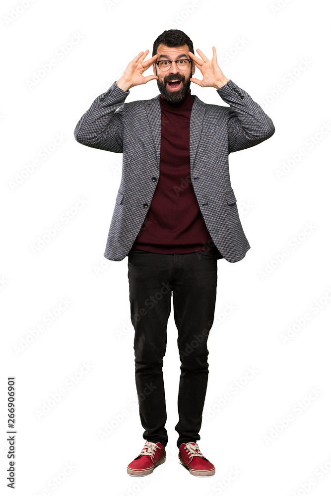 Handsome man with glasses with surprise expression over isolated white background Handsome man with glasses with surprise expression over isolated white background