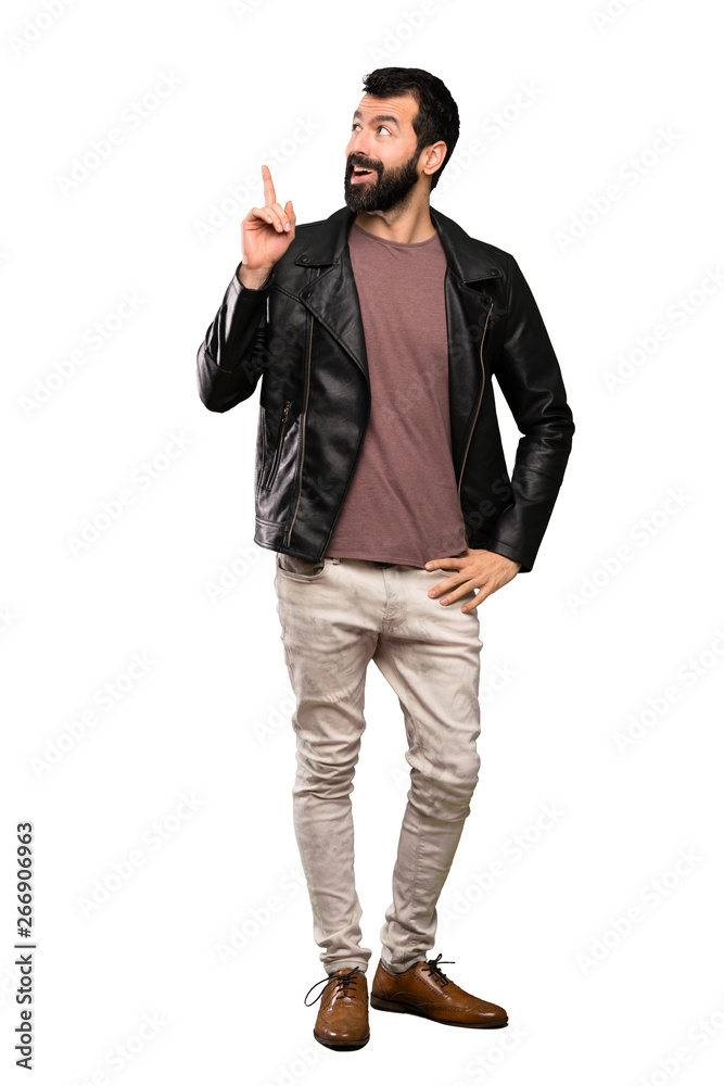 Handsome man with beard thinking an idea pointing the finger up over isolated white background Handsome man with beard thinking an idea pointing the finger up over isolated white background