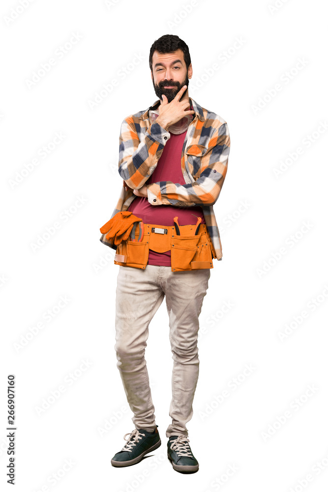 Craftsmen man thinking over isolated white background Craftsmen man thinking over isolated white background