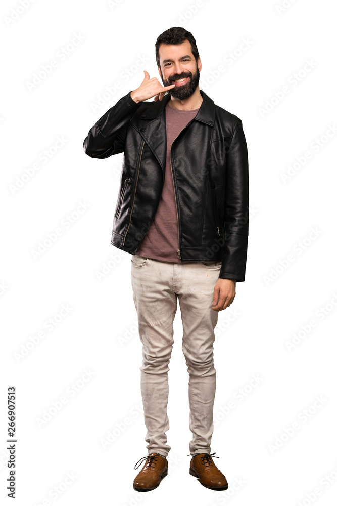 Handsome man with beard making phone gesture. Call me back sign over isolated white background Handsome man with beard making phone gesture. Call me back sign over isolated white background