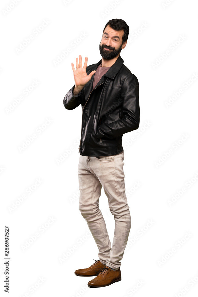 Handsome man with beard counting five with fingers over isolated white background Handsome man with beard counting five with fingers over isolated white background