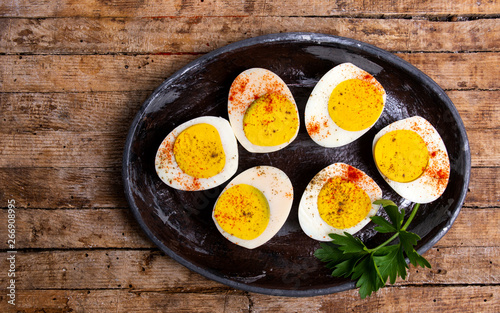 Boiled eggs on a plate top view