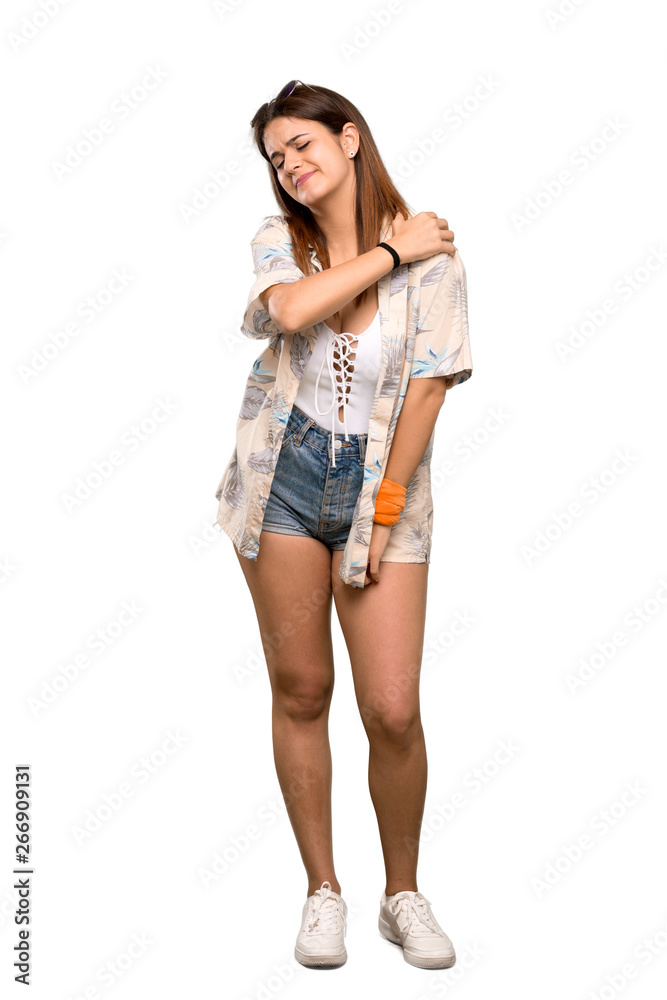 Full-length shot of Young woman in bikini in summer holidays suffering from pain in shoulder for having made an effort over isolated white background Full-length shot of Young woman in bikini in summer holidays suffering from pain in shoulder for having made an effort over isolated white background