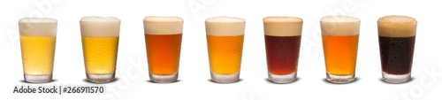 Photo Set of many beer glasses with different beer isolate on white background