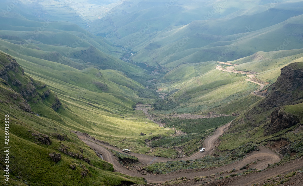 Fototapeta premium The Sani Pass, winding dirt road through the mountains connecting Underberg in South Africa to Mokhotlong in Lesotho. 