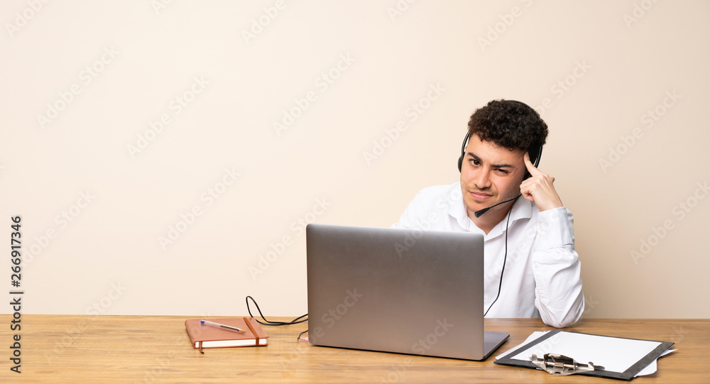 Telemarketer man having doubts and thinking Telemarketer man having doubts and thinking