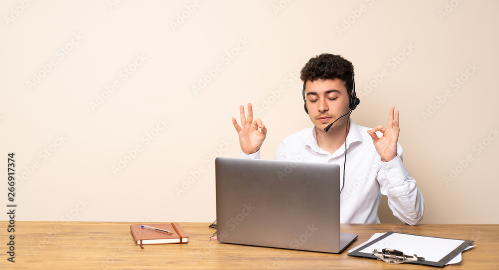 Telemarketer man in zen pose Telemarketer man in zen pose