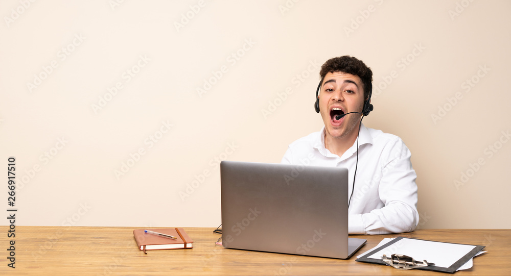 Telemarketer man shouting to the front with mouth wide open Telemarketer man shouting to the front with mouth wide open