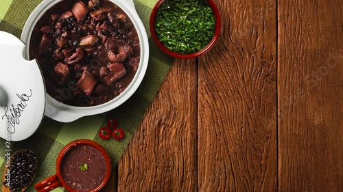 Stop motion Brazilian Feijoada Food. Top view with copy space. 