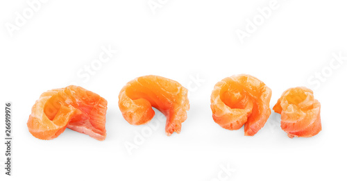 Set of juicy slices of salmon isolated on white background