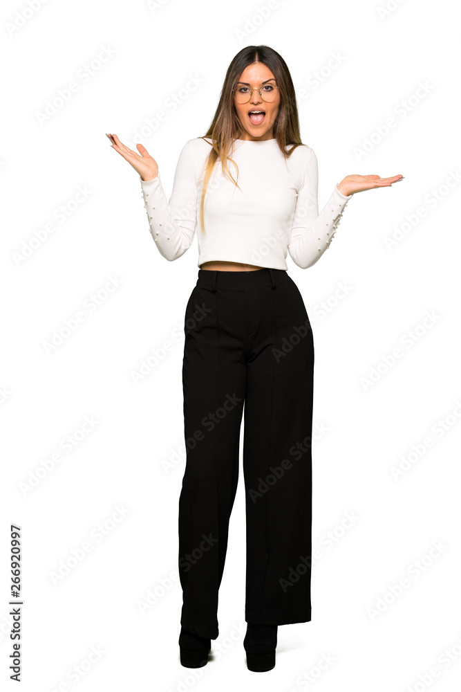 Full body of Pretty woman with glasses with surprise and shocked facial expression Full body of Pretty woman with glasses with surprise and shocked facial expression