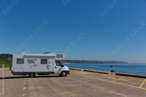 Motorhome parked in car park by the beach Slapton Sands England UK photo