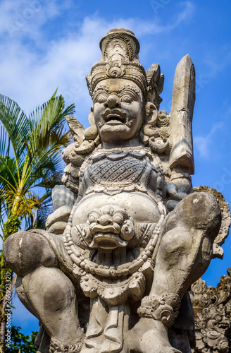 Gard statue on a temple entrance door  Ubud  Bali  Indonesia