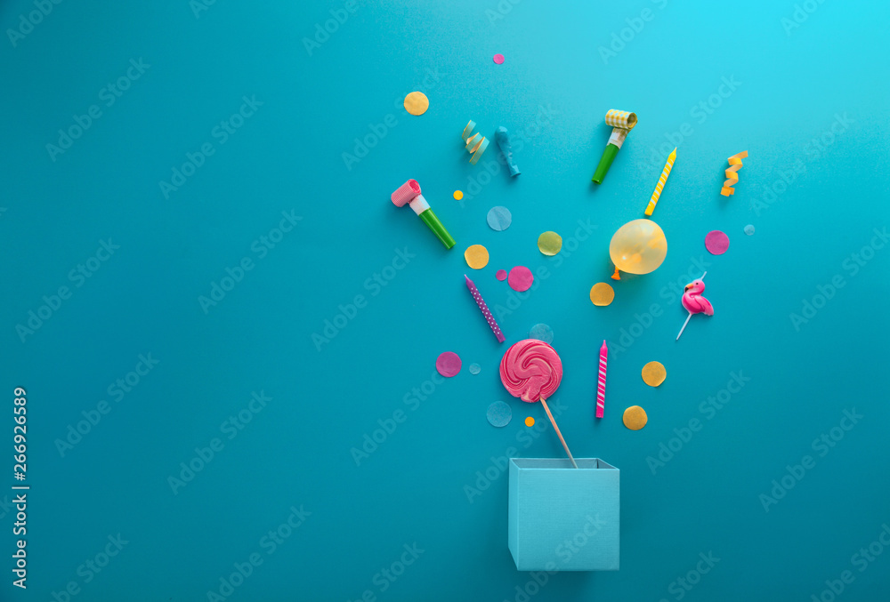 Birthday concept with  present and confetti - obrazy, fototapety, plakaty 