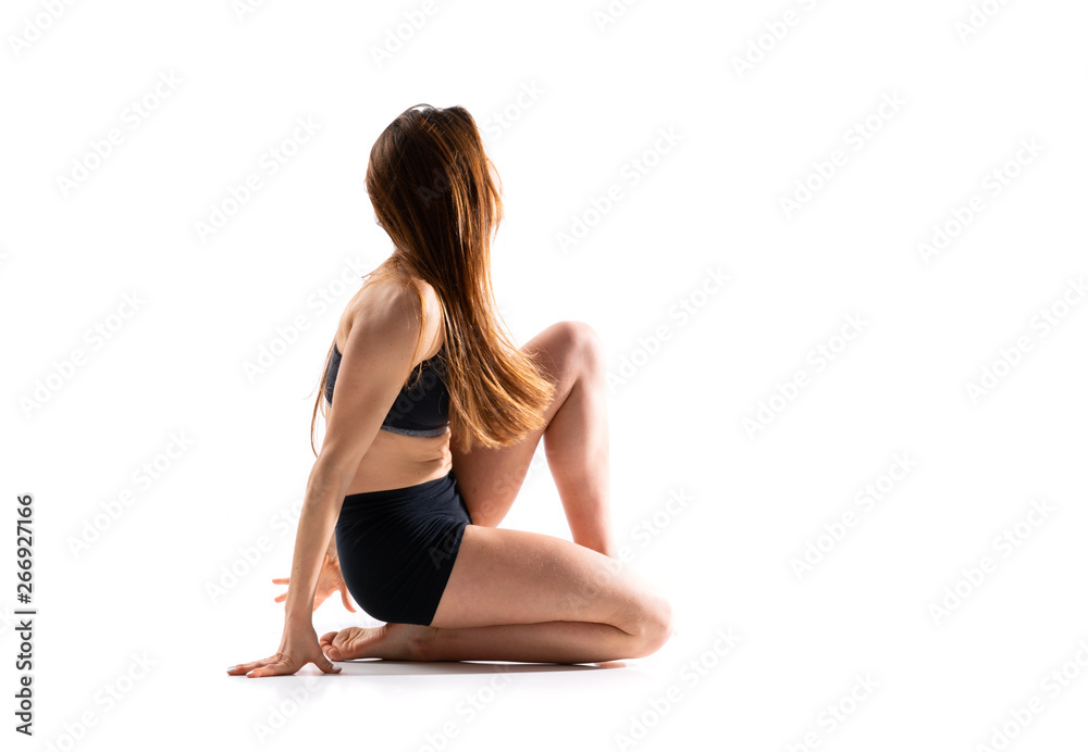 Young dance girl over isolated white background . Young dance girl over isolated white background .