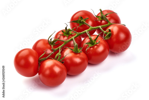Fresh cherry tomato, close-up, isolated on white background