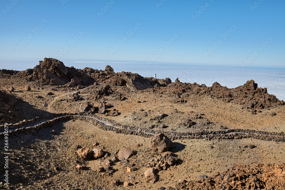 Mars like landscape of the volcano Teide Las Canadas Caldera with hardened lava, at sunset, Teide National Park, Tenerife, Spain. Mars like landscape of the volcano Teide Las Canadas Caldera with hardened lava, at sunset, Teide National Park, Tenerife, Spain.