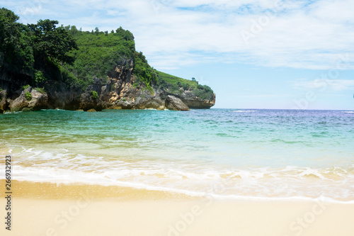 blue sky and beautiful beach. Vacation holidays background wallpaper. View of nice tropical beach. © yudhistirama