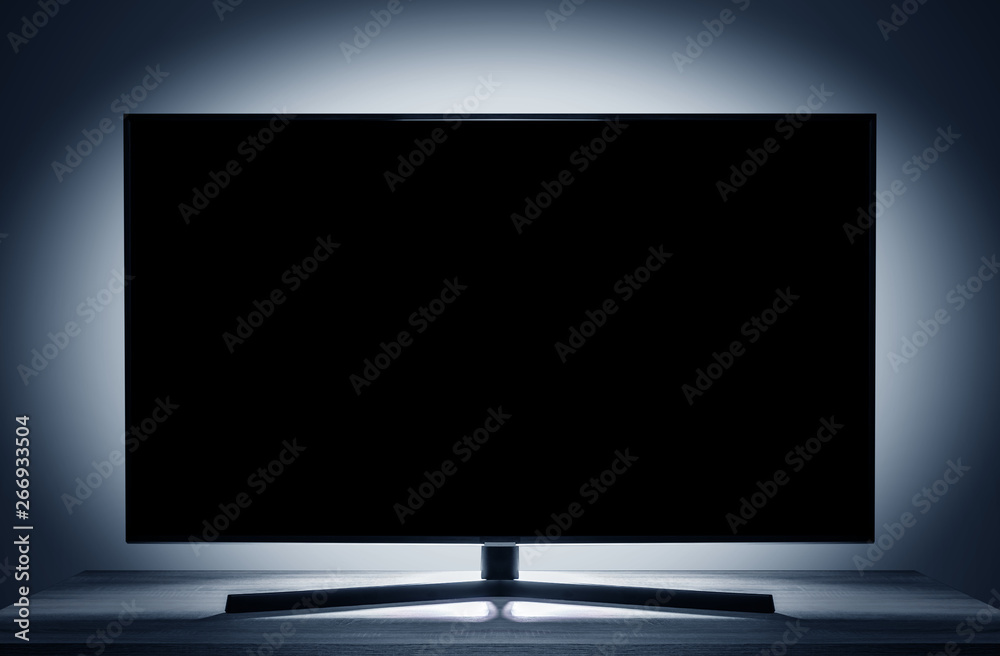 Smart TV in the room in the interior with a blank screen. Smart TV in the room in the interior with a blank screen.