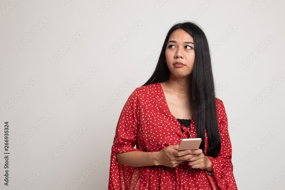 Young Asian woman with mobile phone. Young Asian woman with mobile phone.