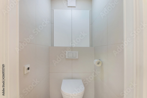 Small toilet room interior