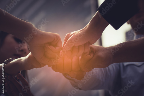 Business people joining hands.Businessmen handshake show teamwork 