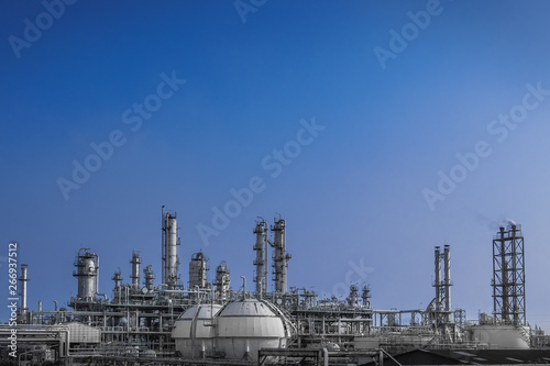 Manufacturing of petrochemical plant on blue sky background, Oil and gas refinery plant with storage sphere tank