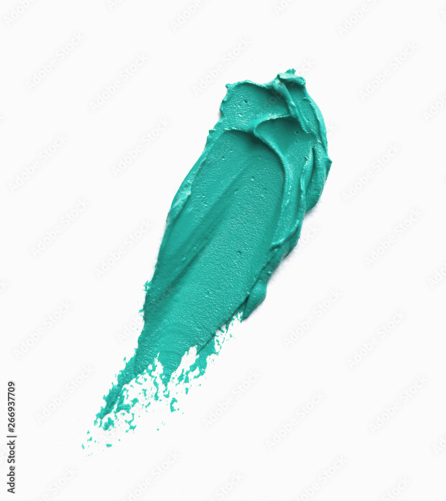 Blue-green paint smudge isolated on white background 