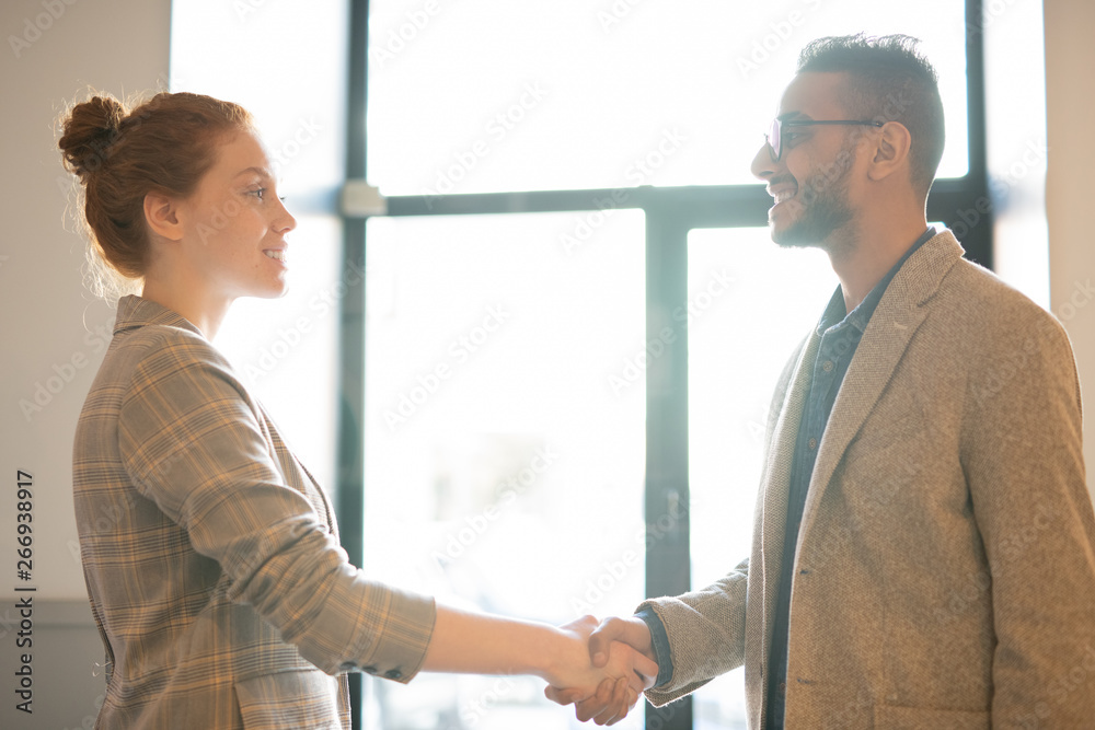 Greeting by handshake Greeting by handshake