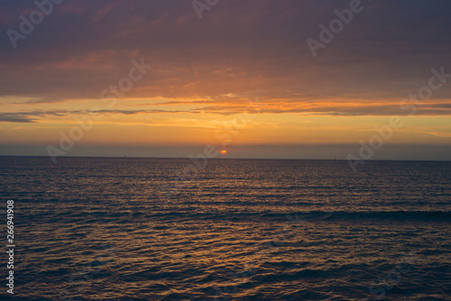 Beautiful sunset over the sea. Bright sunset sky with clouds. Black sea  Anapa  Krasnodar region  Russia