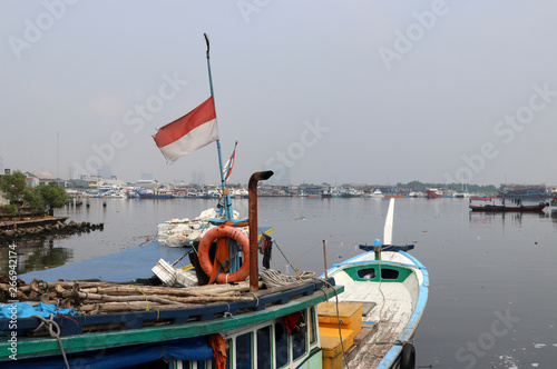 Indonesia fishing boat docked at the pier.