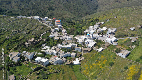 Aerial drone spring photo of picturesque beautiful twin villages of Ktikados and Hatzirados with traditional architecture overlooking seaside village of Kionia, Tinos island, Cyclades, Greece photo