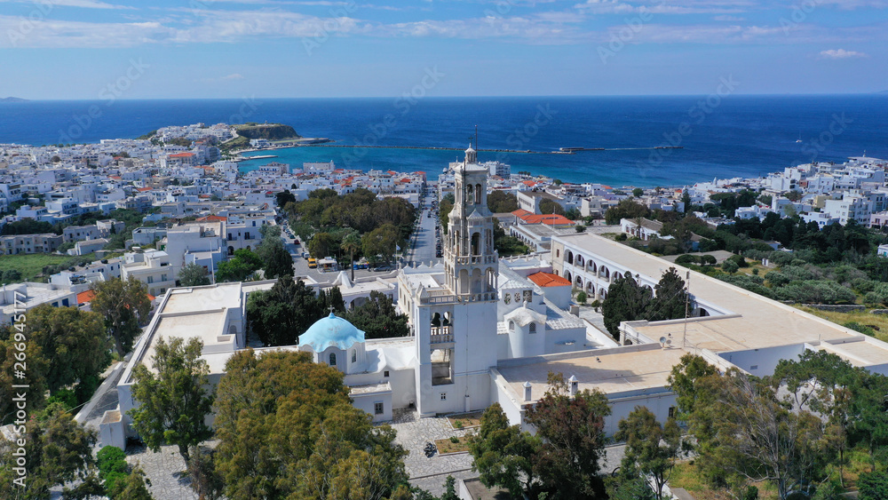 Fototapeta premium Aerial drone panoramic photo of iconic orthodox church of Lady of Tinos island or Church of Panagia Megalochari (Virgin Mary), Cyclades, Greece