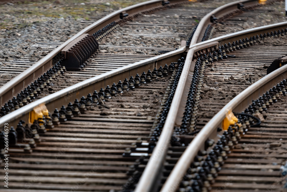 Obraz premium Multiple railway track switches , symbolic photo for decision, separation and leadership qualities. - Image