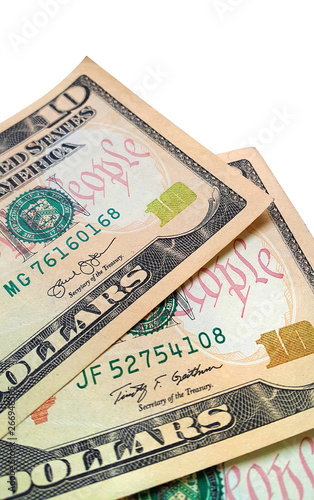Close-up of american paper dollars isolated on white