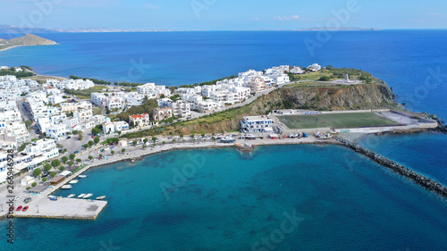 Aerial drone photo of iconic main town and port of Tinos island featuring monastery of Panagia Megalochari  Virgin Mary   Cyclades  Greece