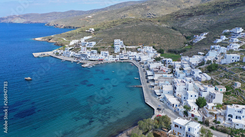 Aerial drone photo of picturesque beautiful fishing village and small harbour of Panormos, Tinos island, Cyclades, Greece