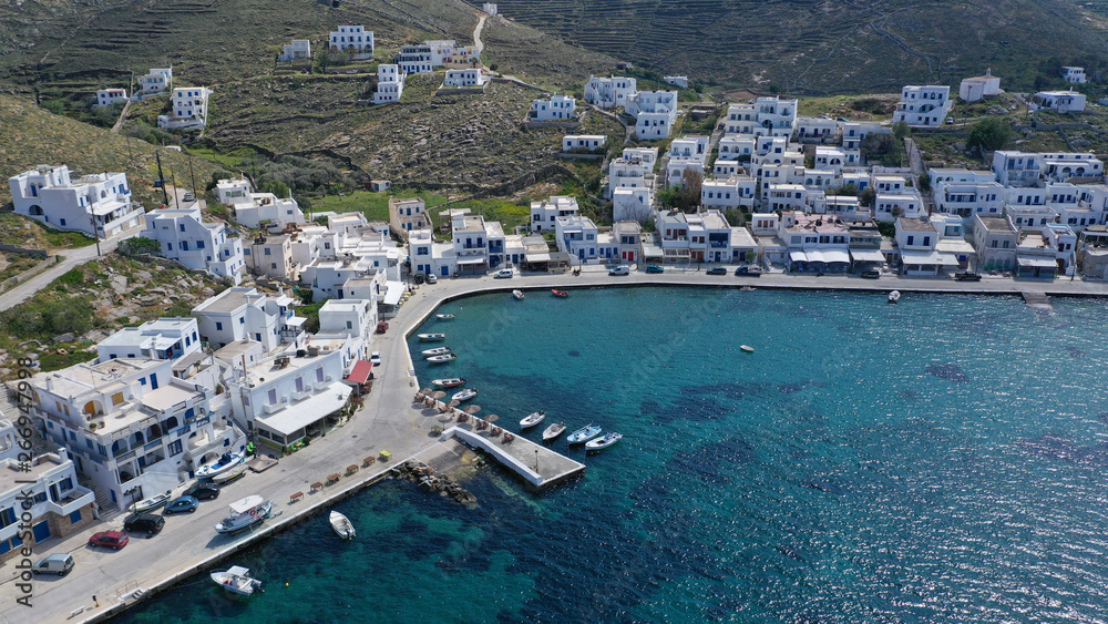 Fototapeta premium Aerial drone photo of picturesque beautiful fishing village and small harbour of Panormos, Tinos island, Cyclades, Greece