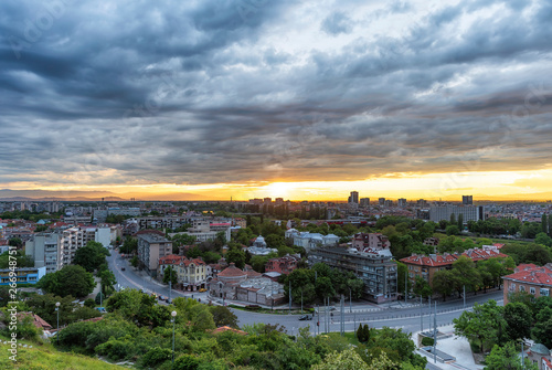 sunset over Plovdiv city, Bulgaria. Panoramic view from one of the hills - Nebet tepe with walls from ancient fortress. European capital of culture 2019.