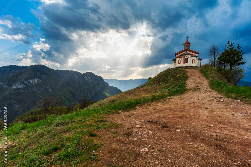 Small chapel in Rhodope mountain near Borovo village, spring sunset photo from Bulgaria