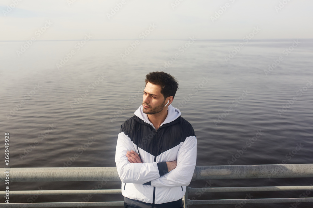Athlete by waterside Athlete by waterside