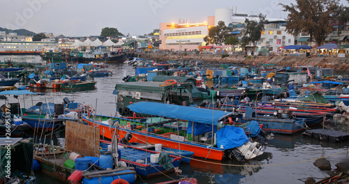 Photography Crowded of small boat in the sea of Cheung chau island in the evening